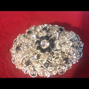Brooch with dark blue and white rhinestones